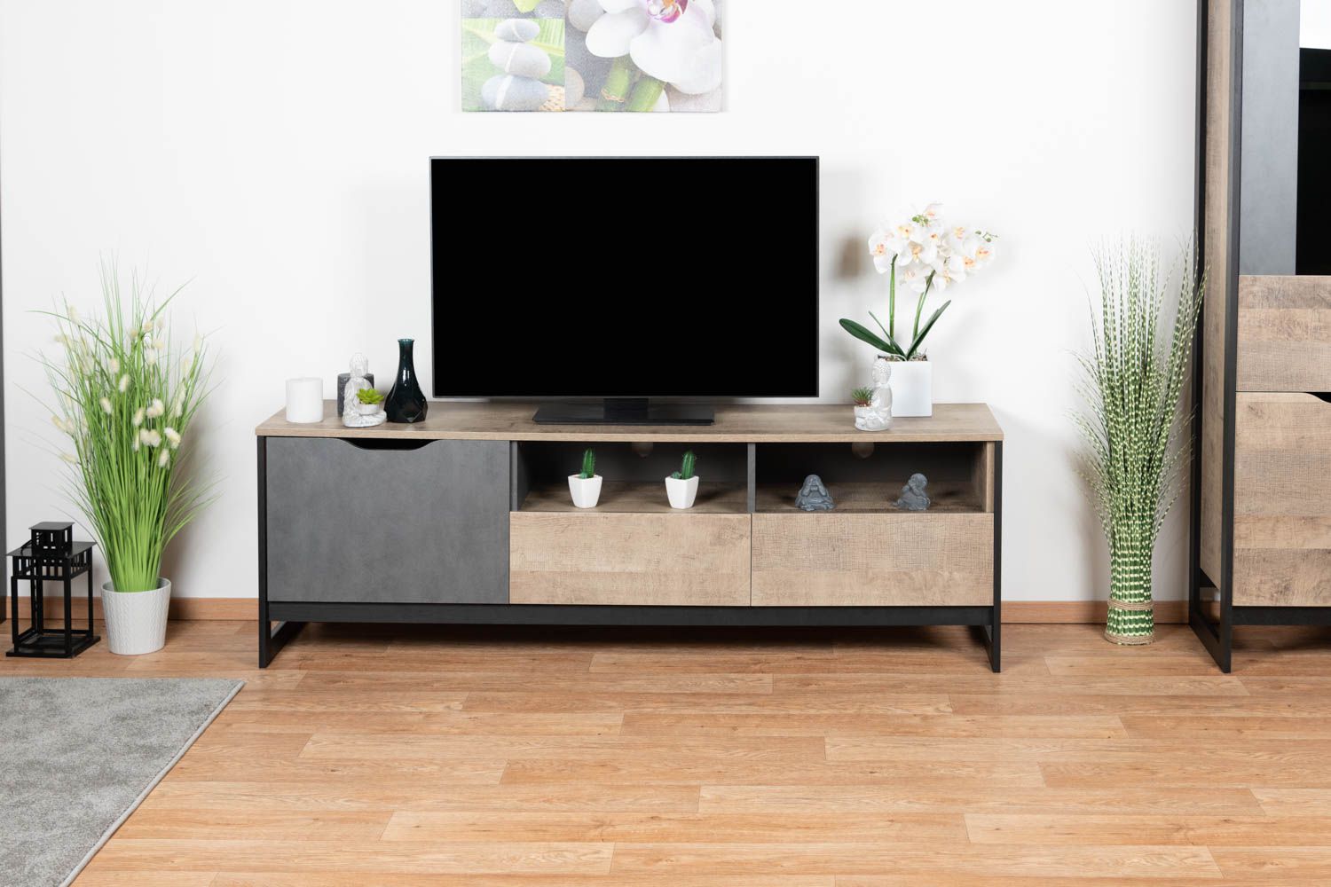 Meuble bas TV Bassatine 03, Couleur : Chêne rustique / Gris / Noir - 53 x 161 x 40 cm (H x L x P)